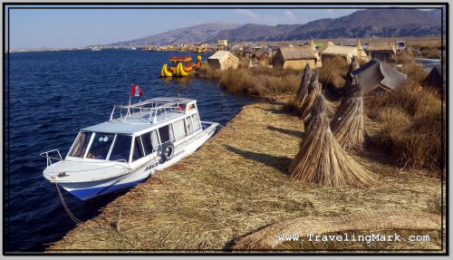 Photo: Boat with Which We Arrived on Uros Island Is Docked on Side of Floating Mass