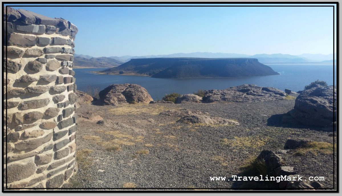 Photo: Sillustani Chullpa in Front of Umayo Lake with Flat Top Island in the Middle