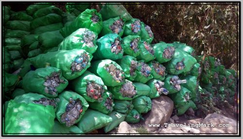 Photo: Piles of Bagged Plastic Bottles Encountered at Hidroelectrica Station Before Machu Picchu