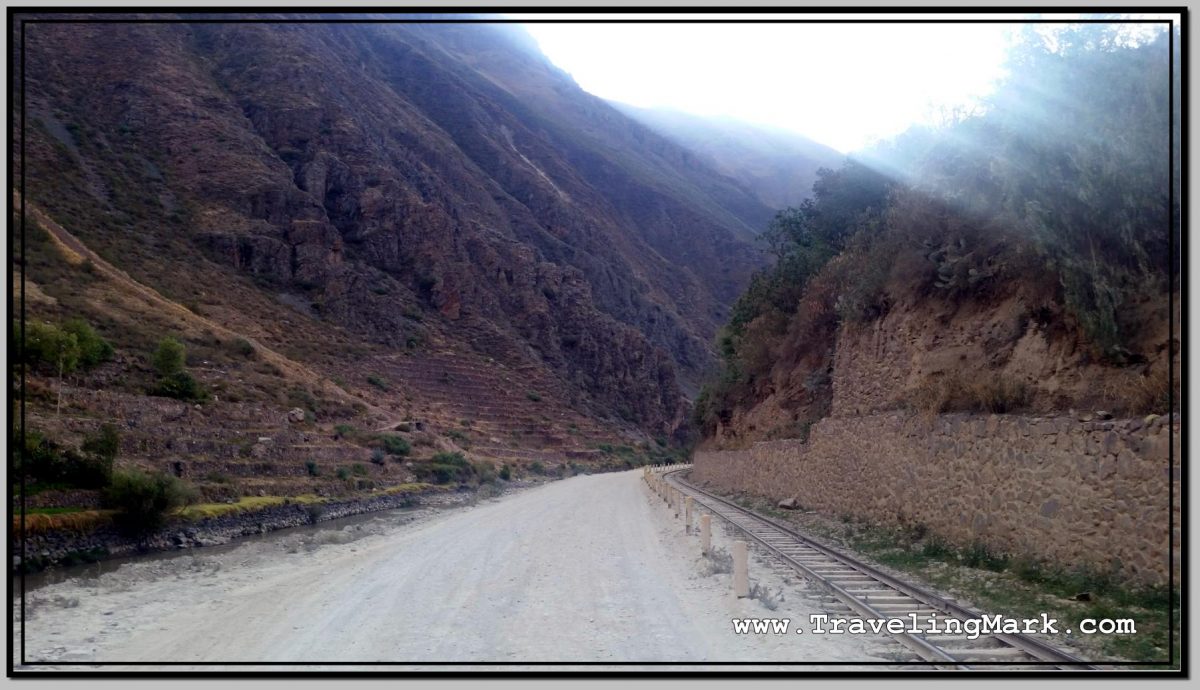 Photo: Railway Tracks Pass By the Pyramid in Ollantaytambo