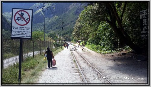 Photo: Beginning of the Foot Trail at Hidroelectrica with Warning that Walking on Train Tracks Is Prohibited