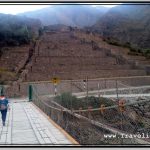 Photo: Pedestrian Uses Suspension Bridge to Walk Toward the Pyramid