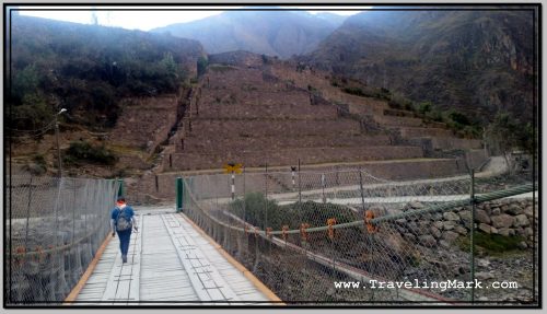 Photo: Pedestrian Uses Suspension Bridge to Walk Toward the Pyramid